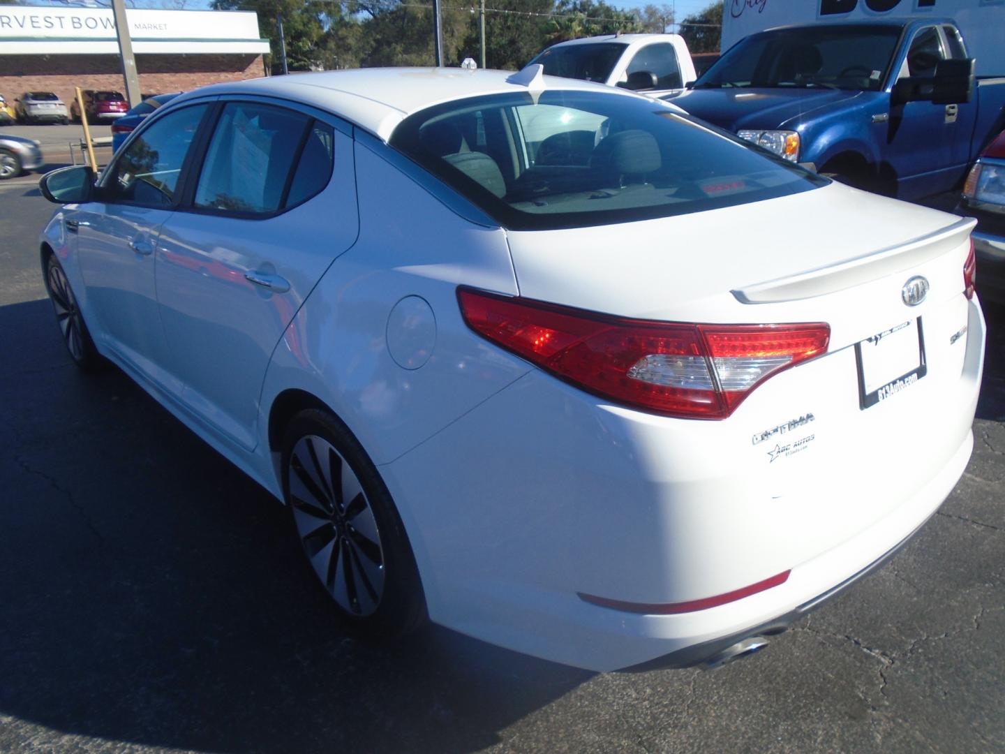 2012 Kia Optima (5XXGR4A62CG) , located at 6112 N Florida Avenue, Tampa, FL, 33604, (888) 521-5131, 27.954929, -82.459534 - Photo#4